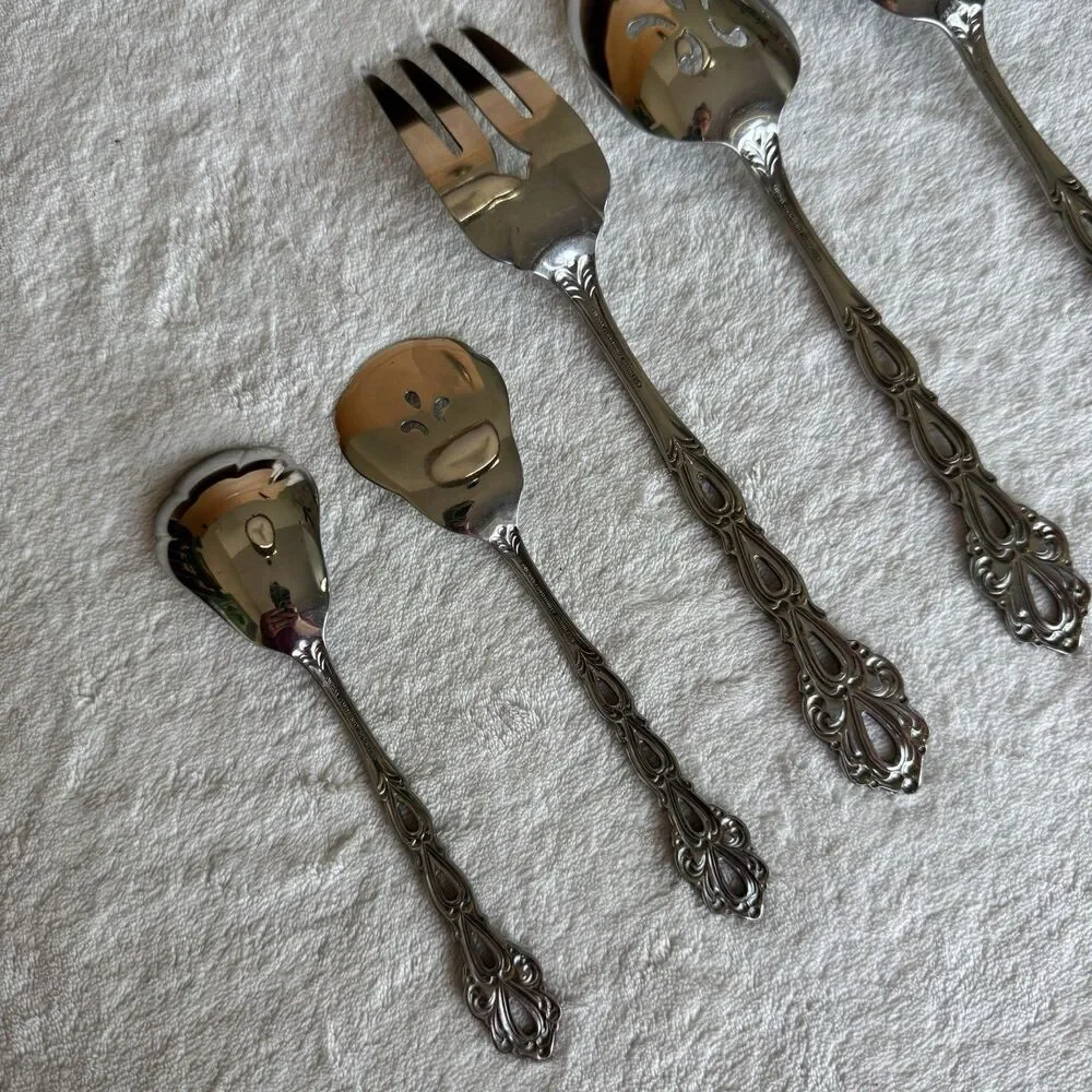 Vintage 7-piece Oneida Community Chandelier serving utensil set in stainless MCM
